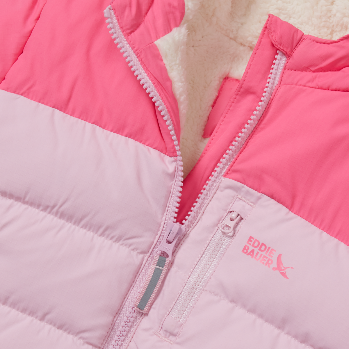 Pink and light pink color-block down jacket with full-length zipper and branded logo on chest.