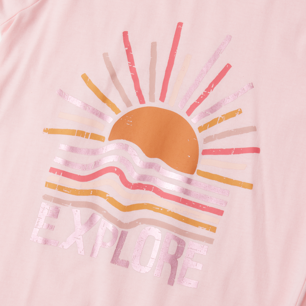 Light pink long sleeve tee with colorful sun graphic and "SAILOR" text in distressed lettering.