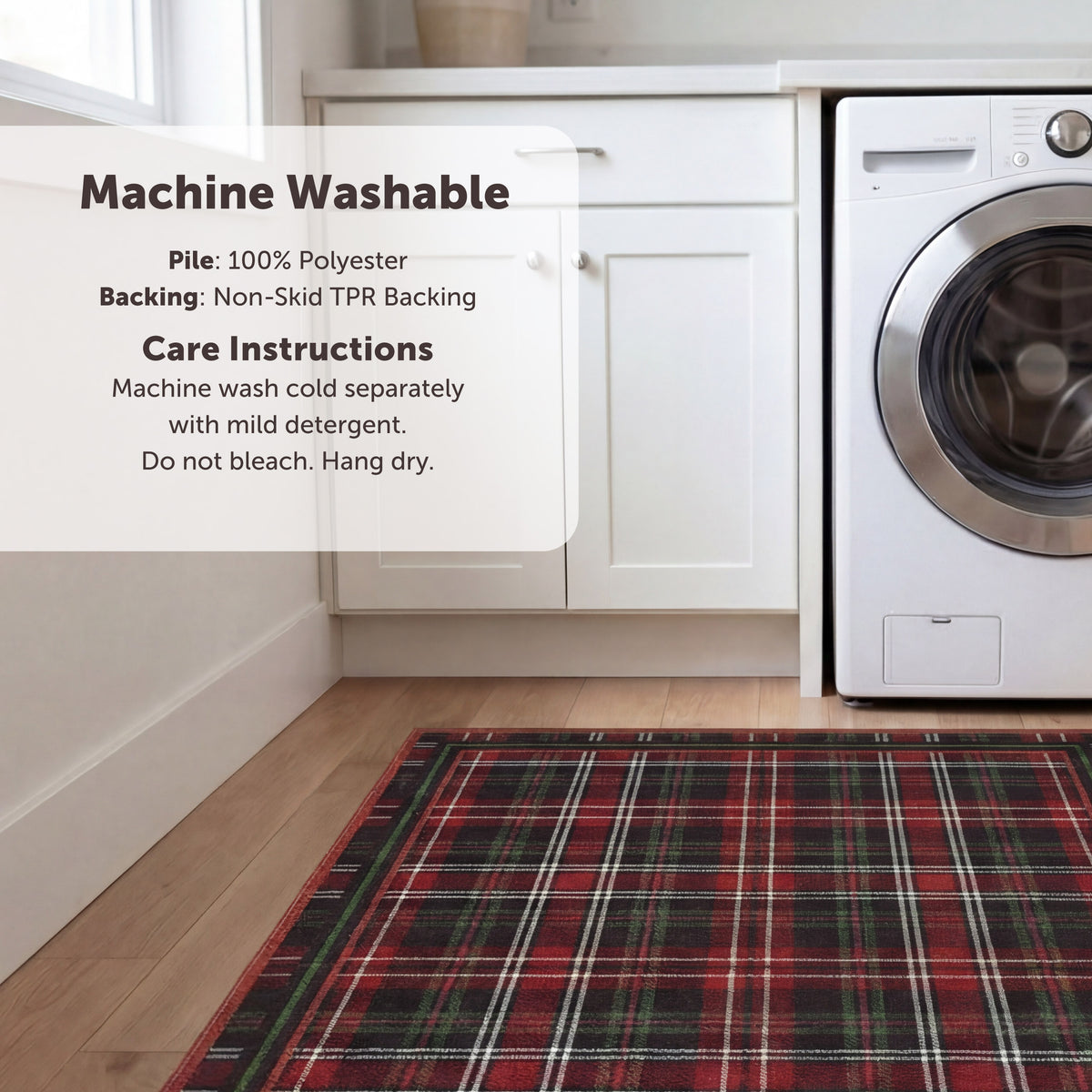 Red plaid rug on a wooden floor with washing machine and cabinets in the background